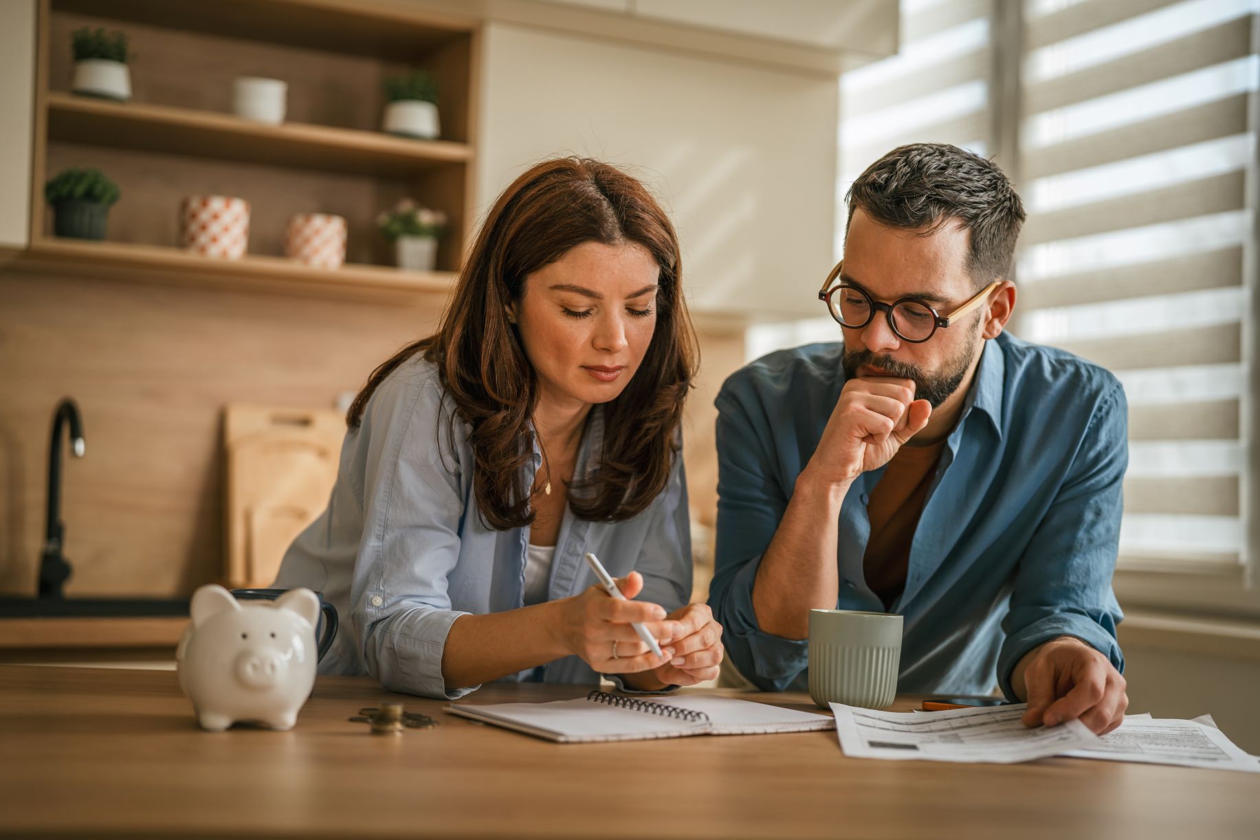 Couple managing home finances